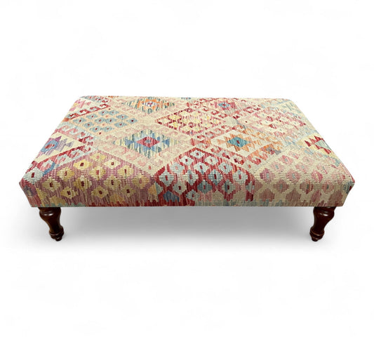 Kilim Table Stool with traditional patterned kilim cover, 120cm x 75cm dimensions, featuring dark brown divan-style legs