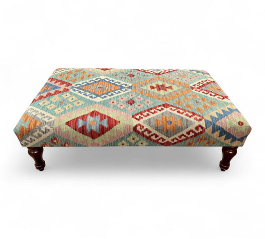 Kilim Table Stool with traditional patterned kilim cover, 120cm x 75cm dimensions, featuring dark brown divan-style legs