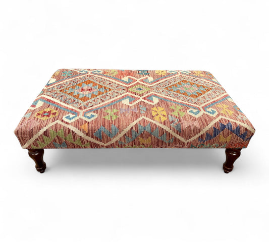 Kilim Table Stool with traditional patterned kilim cover, 120cm x 75cm dimensions, featuring dark brown divan-style legs