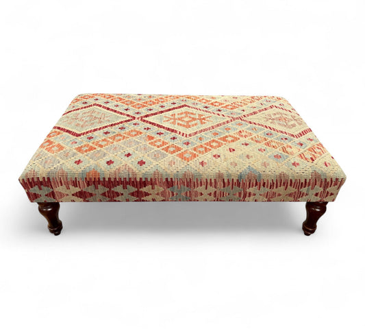 Kilim Table Stool with traditional patterned kilim cover, 120cm x 75cm dimensions, featuring dark brown divan-style legs