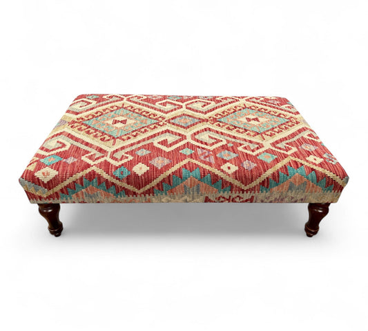 Kilim Table Stool with traditional patterned kilim cover, 120cm x 75cm dimensions, featuring dark brown divan-style legs