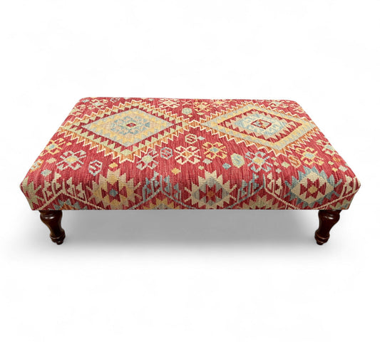 Kilim Table Stool with traditional patterned kilim cover, 120cm x 75cm dimensions, featuring dark brown divan-style legs