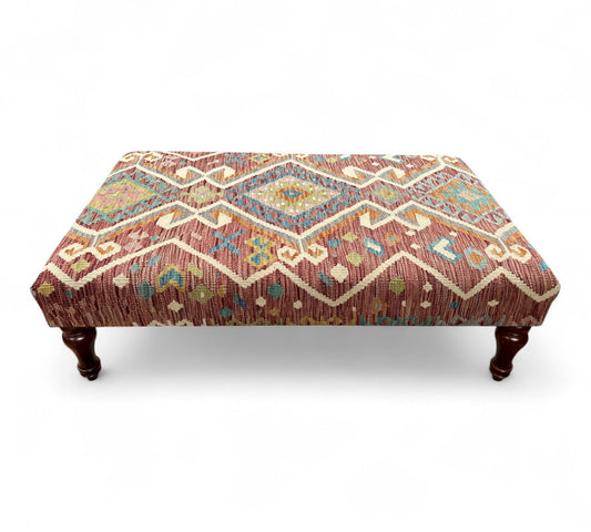 Kilim Table Stool with traditional patterned kilim cover, 120cm x 75cm dimensions, featuring dark brown divan-style legs