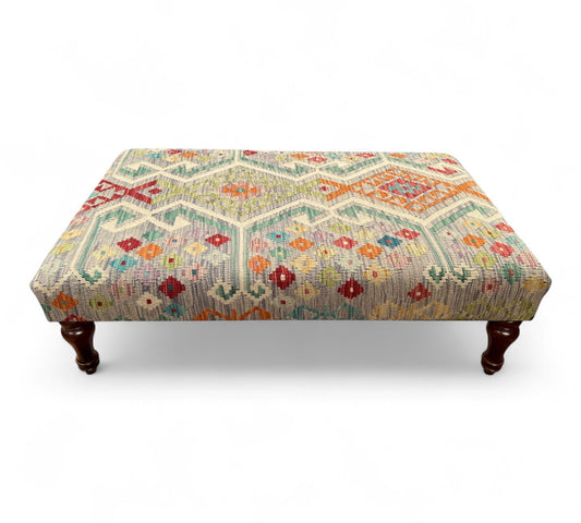 Kilim Table Stool with traditional patterned kilim cover, 120cm x 75cm dimensions, featuring dark brown divan-style legs