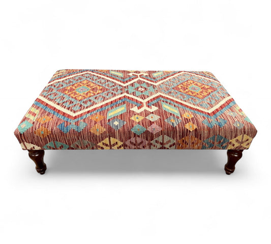 Kilim Table Stool with traditional patterned kilim cover, 120cm x 75cm dimensions, featuring dark brown divan-style legs